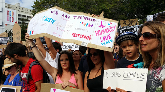 "We are the world" at the Charlie Hebdo rally in Auckland today. Image: David Robie/PMC