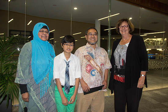 Senior lecturer Eileen Lavranos (right) with television double award-winner Sasya Wreksono's family, Hanny, Dio and Sony, last night. Sasya is currently in Indonesia. Image: Michael Neilson/PMC