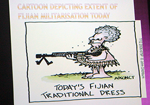 The Fiji militarisation cartoon ... gun and a traditional bullets "lei". Image: Del Abcede/PMC