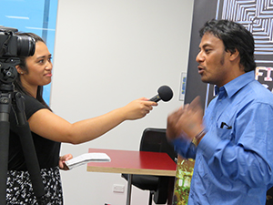 Pacific Media Watch's Alistar Kata interviews Taberannang Korauaba last night. Image: Del Abcede/PMC 