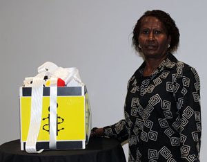 Joycelyn Lai of the SI Young Women's Christian Association and the 20,000 signatures of the Amnesty International petition in support of Pacific women's human rights. Photo: Myles Idoko Ojabo