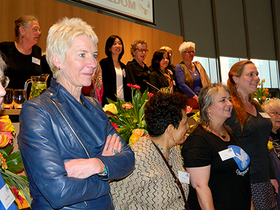 WILPF's Madeleine Rees stands with other women at the 2015 conference in the Netherlands. Image: Del Abcede/ PMC