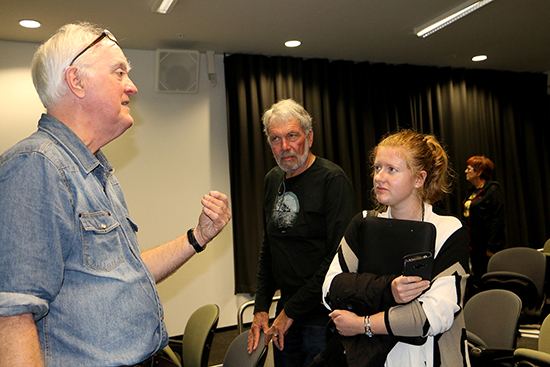 Murray Horton speaking to broadcaster Ray Mankelow and Pacific Media Watch journalist Kendall Hutt with Sally James in the background at the seminar. Image: Del Abcede/PMC