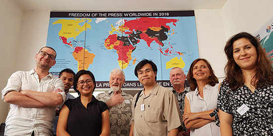 RSF’s Asia-Pacific head Daniel Bastard (left) and his colleague Myriam Sni (right) with some of the Pacific and Southeast Asian press defenders. Image: RSF