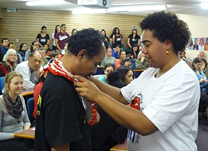 Kalisiana Bulirua of Oceania Interrupted presenting Victor Mambor with an ula lei at the weekend West Papua seminar. Image: Paul Bensemann