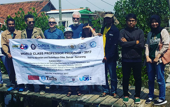  Three of the professors on the WCP programme - including Dr David Robie (centre rear) - at Tinbulsloko village, near Semarang. Image: Del Abcede/PMC