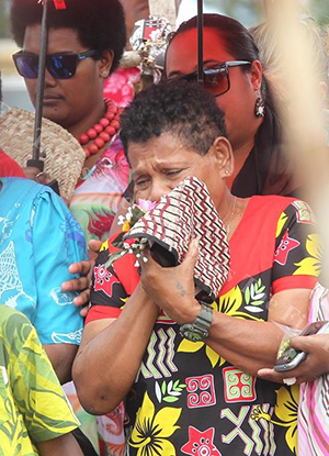 Kelera McGowan mourns the death of her daughter Losana McGowan at the Nasinu cemetery yesterday. Image: Atu Rasea/Fiji Times