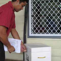 Preparing ballot boxes for the Samoan election.