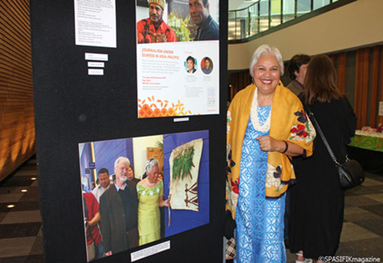 Victoria University's Assistant Vice-Chancellor (Pacific) Laumanuvao Winnie Laban at the celebration last  night next to a photo of her opening the centre in 2007. Image: Mata Lauano/Spasifik