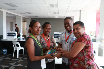 Pacific journalists pose with their returned passports. Image: ONOC Digest