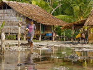 Cleaning up after the wreckage in the Solomon Islands. Image: Solomon Star 