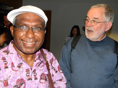 West Papuan journalist and Papuan peace negotiator Octovianus Mote and Pax Christi's Kevin McBride at the WPFD address. Image: Del Abcede/PMC