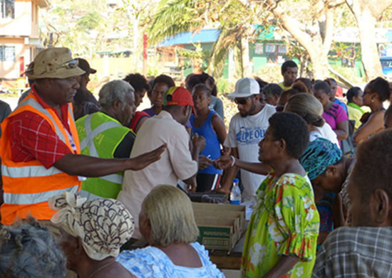 Delivering cyclone relief supplies in Freshwota on Efate Island in Vanuatu. Image: Thompson Marango/VDP